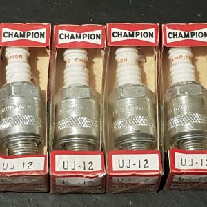 Set of 4 new old stock Champion UJ12 Spark Plugs