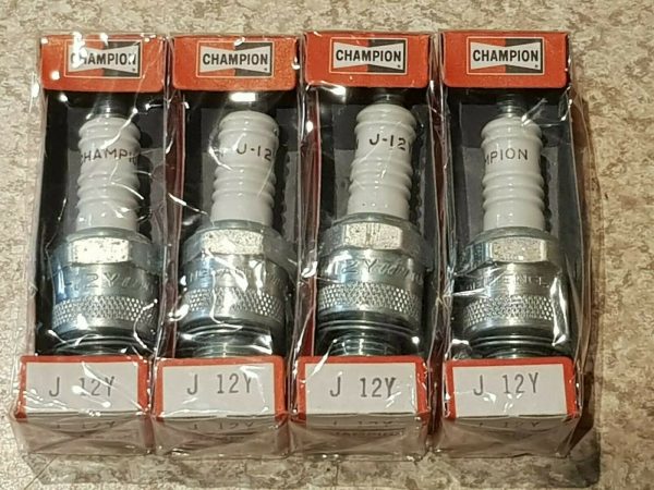 Set of 4 new old stock Champion J12Y Spark Plugs